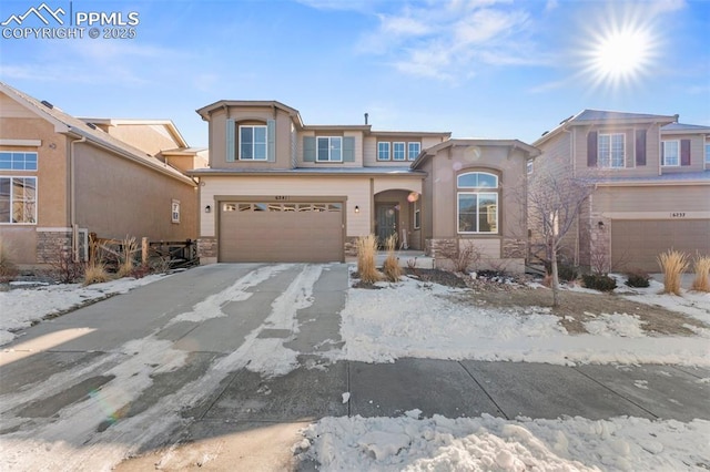 view of front of property featuring a garage