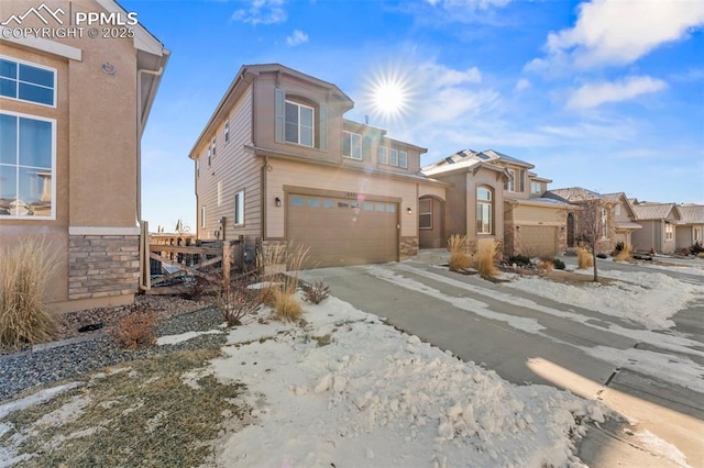 view of front of home with a garage