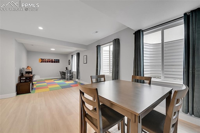 dining room featuring light hardwood / wood-style floors