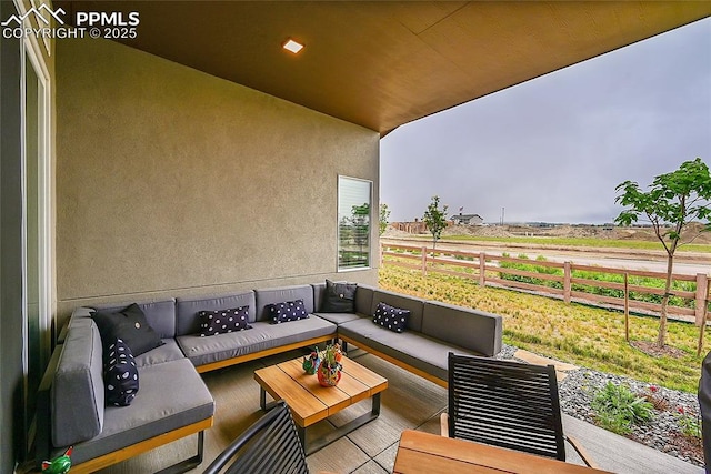 view of patio / terrace with outdoor lounge area and a rural view