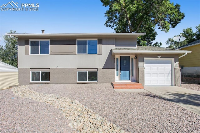 view of front of property featuring a garage