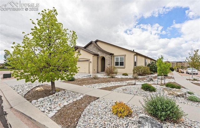 ranch-style home featuring a garage