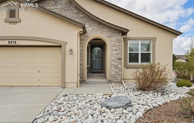 entrance to property featuring a garage