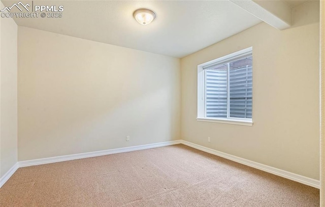 view of carpeted spare room