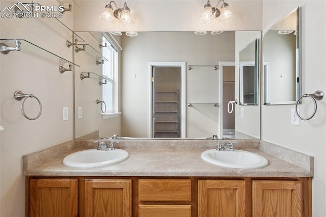 bathroom with vanity and plenty of natural light