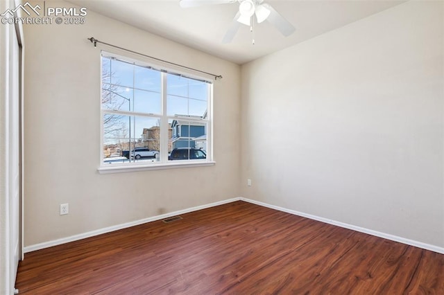 unfurnished room featuring ceiling fan and wood-type flooring