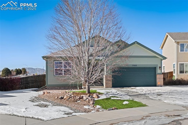 view of front of home featuring a garage