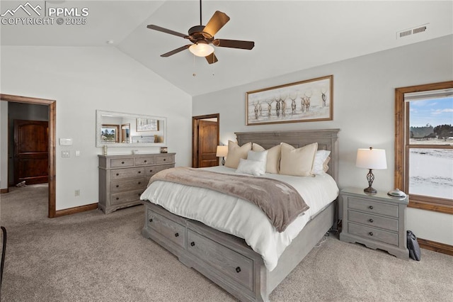 carpeted bedroom featuring ceiling fan and vaulted ceiling