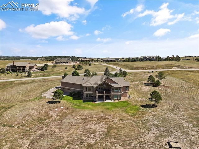 bird's eye view with a rural view