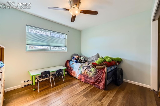 bedroom with hardwood / wood-style flooring and ceiling fan