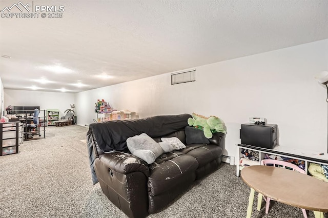 living room with a baseboard heating unit, carpet floors, and a textured ceiling