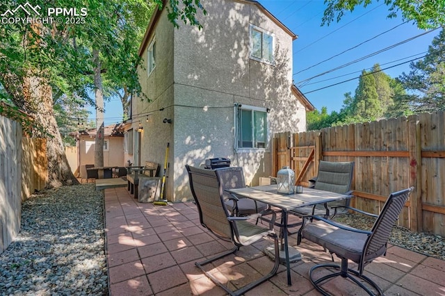 rear view of house featuring a patio area