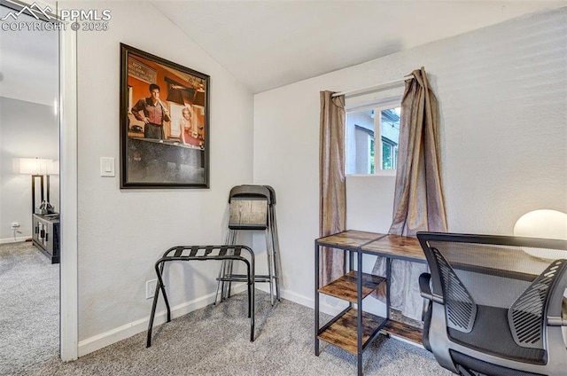 office area featuring lofted ceiling and carpet floors