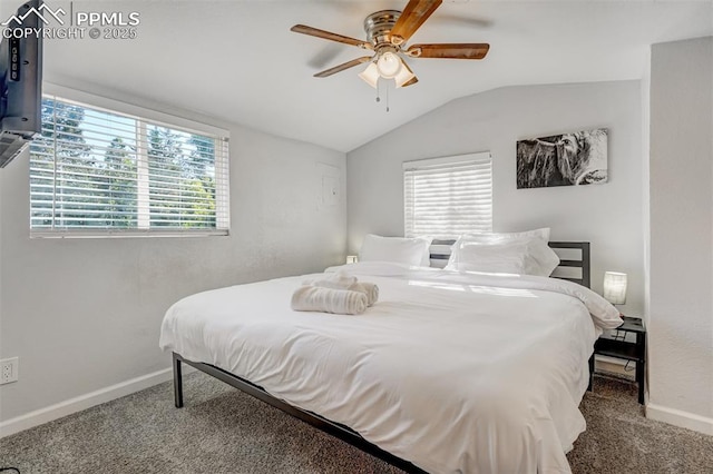 bedroom featuring vaulted ceiling, ceiling fan, and carpet floors