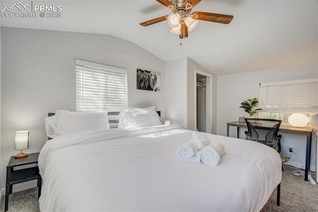 carpeted bedroom with lofted ceiling and ceiling fan