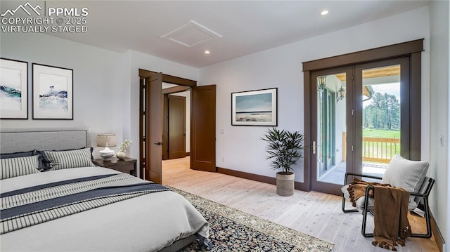 bedroom with access to exterior, french doors, and light wood-type flooring