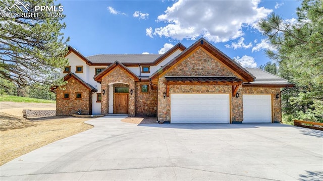 view of front of property with a garage