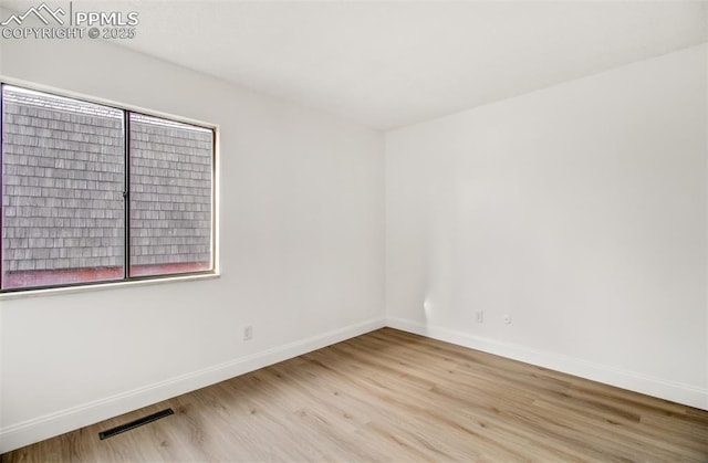 empty room featuring light hardwood / wood-style flooring