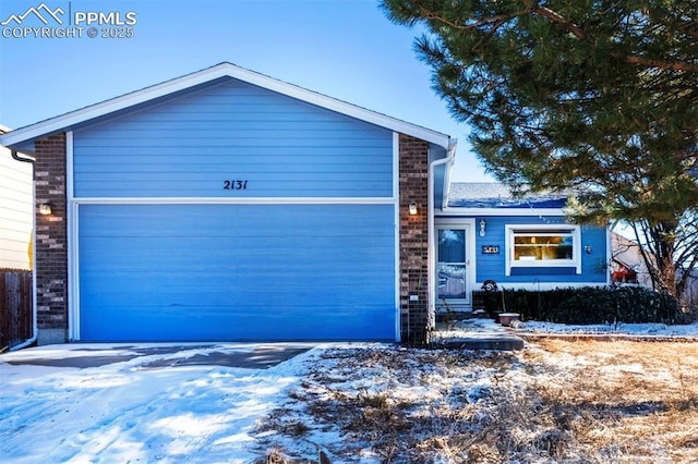 view of front of home with a garage