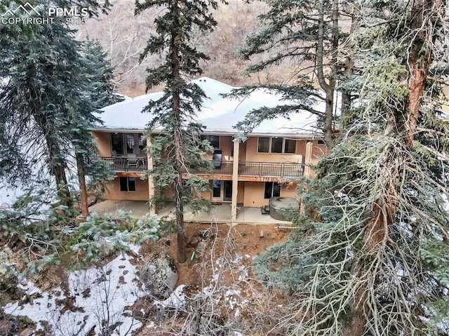 view of snow covered property