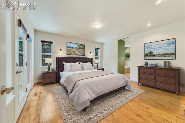 bedroom featuring light hardwood / wood-style flooring