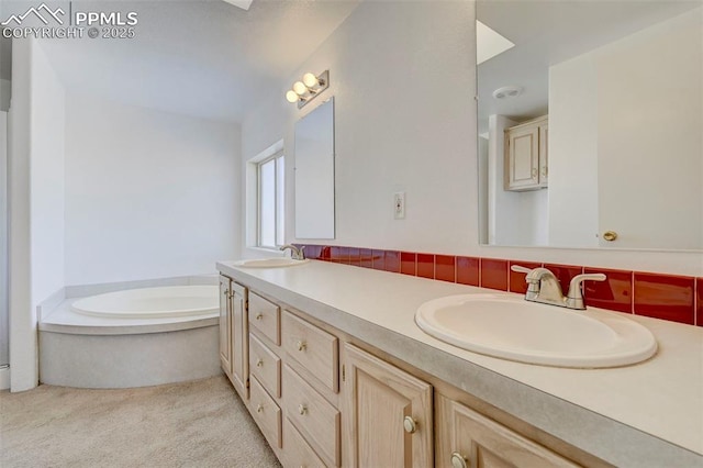 bathroom with decorative backsplash, a bathtub, and vanity