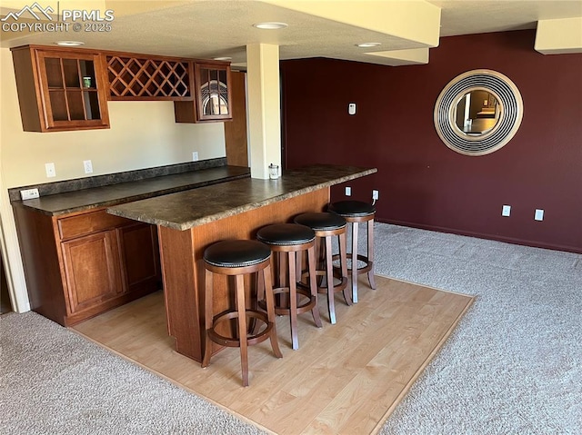 bar featuring light colored carpet