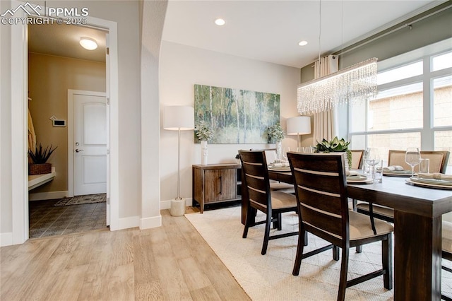 dining area with light hardwood / wood-style flooring