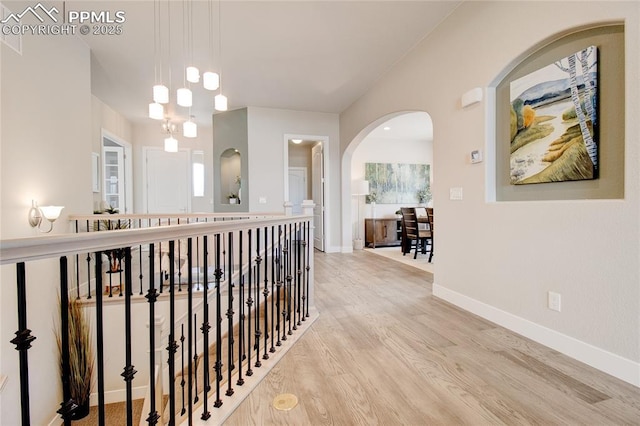 corridor featuring light hardwood / wood-style floors