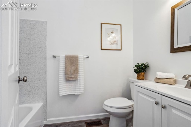 full bathroom featuring toilet, vanity, shower / bath combination, and hardwood / wood-style flooring