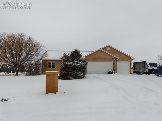 view of front of home with a garage