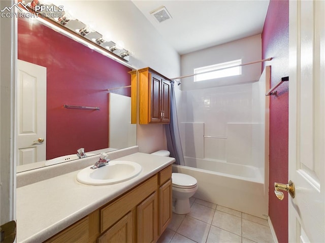 full bathroom featuring shower / washtub combination, toilet, tile patterned flooring, and vanity