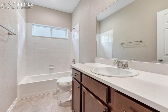 full bathroom featuring shower / tub combination, vanity, and toilet