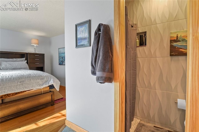 bedroom featuring a textured ceiling