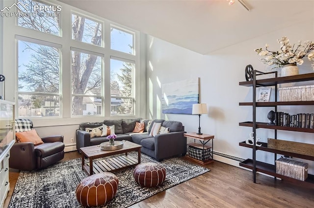 interior space featuring hardwood / wood-style flooring and a baseboard radiator