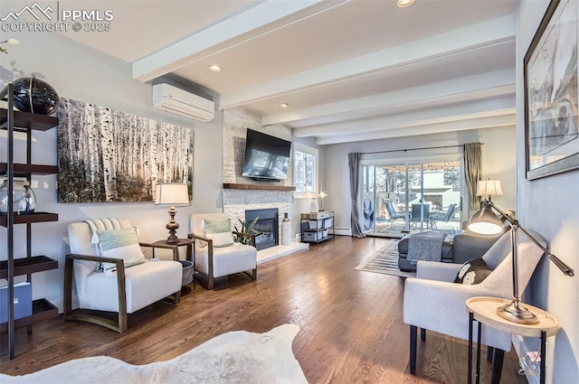 living room featuring an AC wall unit, baseboard heating, hardwood / wood-style floors, beamed ceiling, and a fireplace