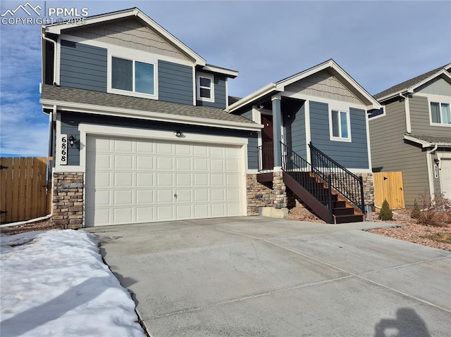 view of front of property with a garage