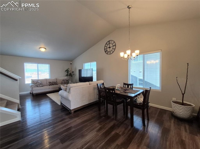 dining space with dark hardwood / wood-style floors, high vaulted ceiling, and a notable chandelier