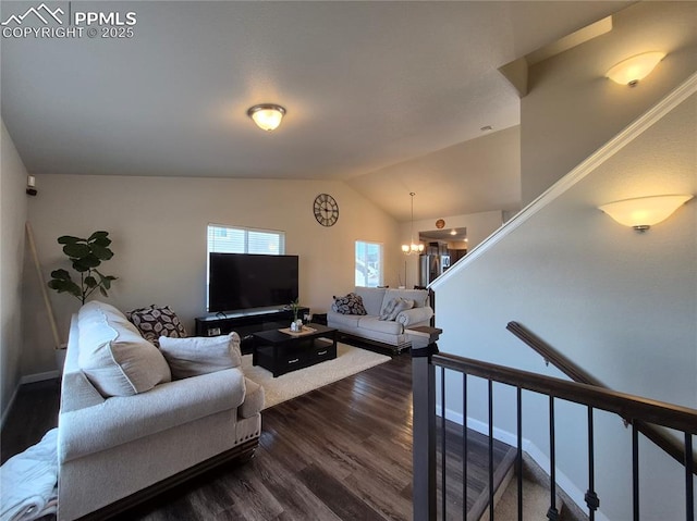 living room with lofted ceiling and dark wood-type flooring