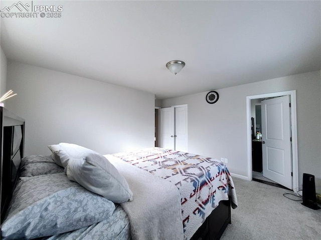 bedroom featuring light colored carpet