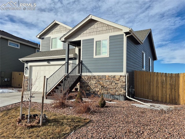 view of front of property with a garage