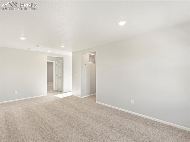 view of carpeted spare room