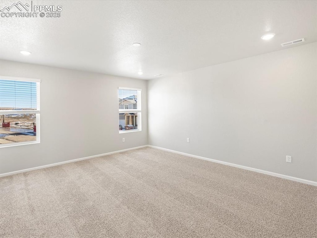 view of carpeted empty room