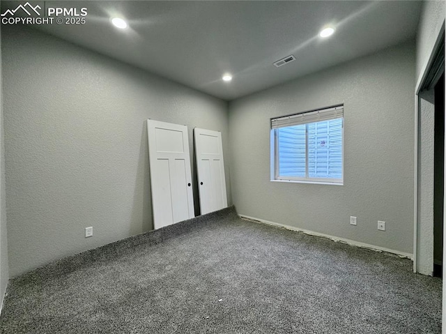 unfurnished bedroom featuring carpet flooring