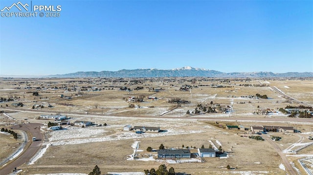 bird's eye view with a rural view and a mountain view