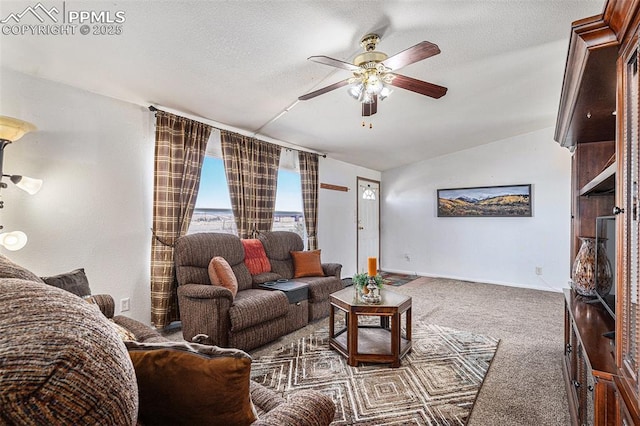 carpeted living room featuring a textured ceiling, ceiling fan, and vaulted ceiling