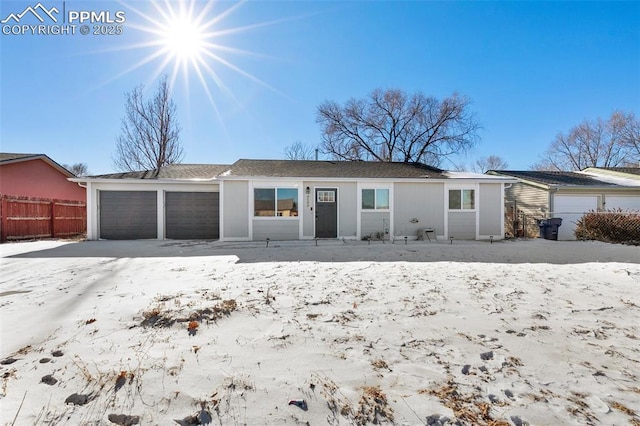 single story home featuring a garage