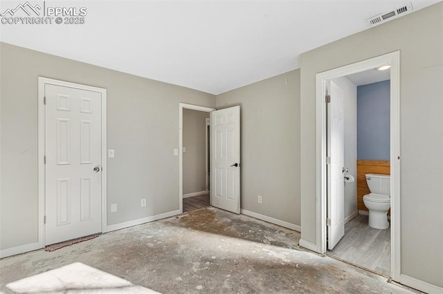 bedroom featuring ensuite bath