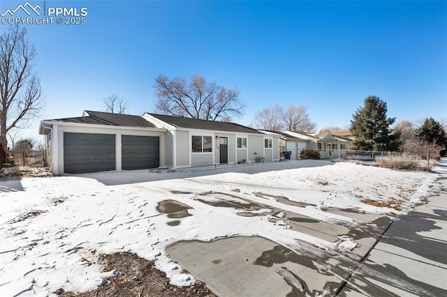 ranch-style home with a garage