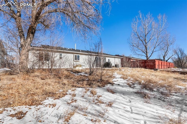 view of snow covered property